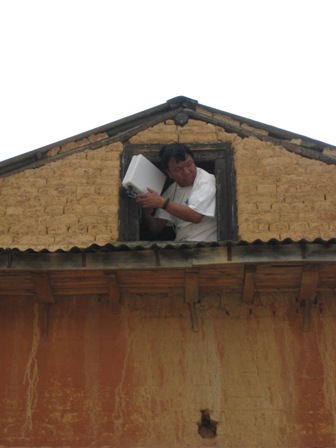 Mahabir fixing the radio