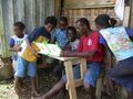 Children and teacher during the hand-over training at Patukae
